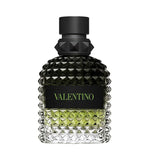 Valentino Uomo Green Stravaganza fragrance bottle with a black cap and studded glass.