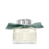 Chloé Rose Naturelle Intense perfume bottle with a green ribbon.