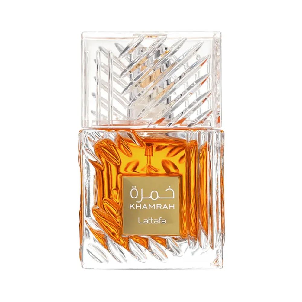 Lattafa Khamrah perfume bottle with amber liquid and clear textured cap.