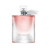 La Vie est Belle perfume bottle with pink liquid and a white ribbon.