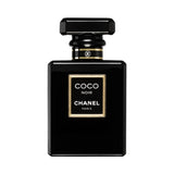 Chanel Coco Noir perfume bottle with black glass and gold accents.