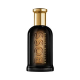 BOSS BOTTLED ELIXIR fragrance bottle with gold cap and dark glass.