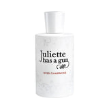 Juliette has a gun Miss Charming perfume bottle with white cap and floral pattern.