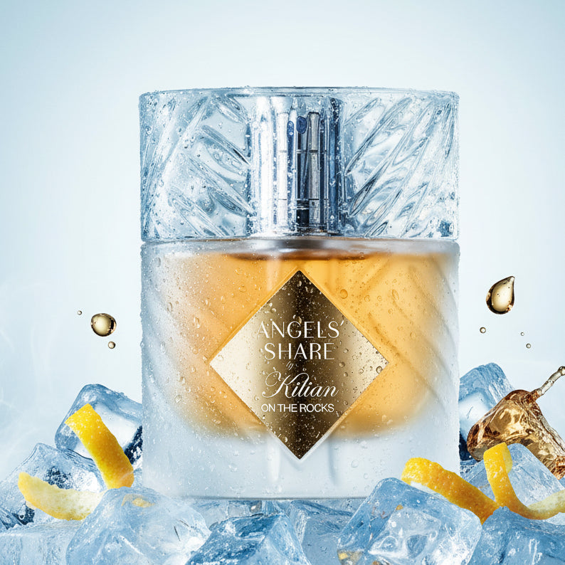 A bottle of Kilian Angels Share On The Rocks perfume with a clear, textured cap.