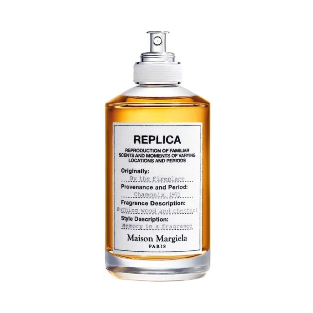 Maison Margiela REPLICA By the Fireplace fragrance bottle with amber liquid.