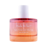 Bouteille de parfum Nectar de Pêche de Nicole Miller avec un liquide rose et orange.