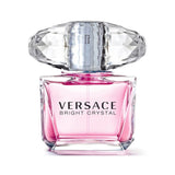 Versace Bright Crystal perfume bottle with pink liquid and a faceted clear cap.